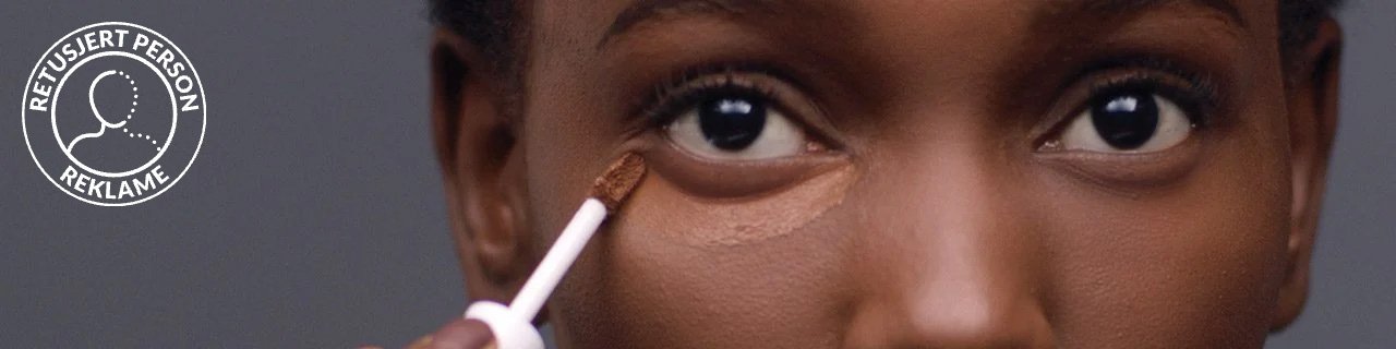 Concealer makeup tutorials illustrative banner image - close up of woman applying concealer under Eye