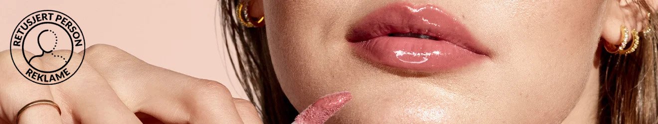 Maybelline Lip gloss products illustrative banner image - Close up of a woman's lips with lip gloss